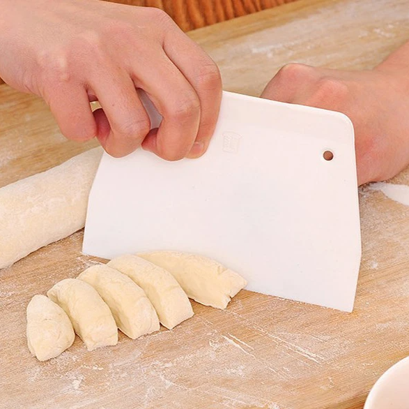 http://lunazshop.com/cdn/shop/products/Cream-cake-dough-and-cut-knife-baking-scraping-board-plastic-scraper-trapezoidal-plate-small-baking-tools_jpg_Q90_jpg.png?v=1675706137