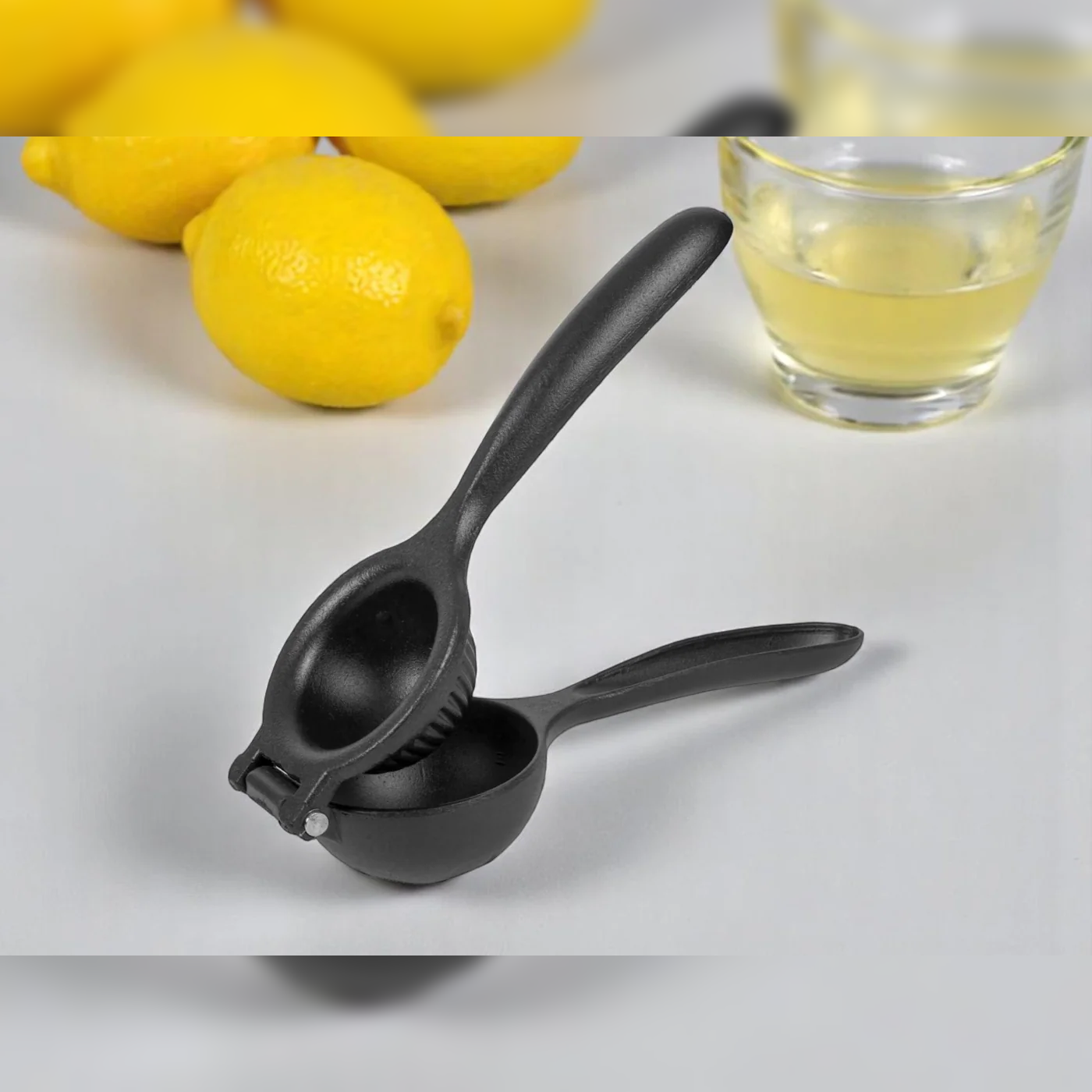 Black hand lemon squeezer